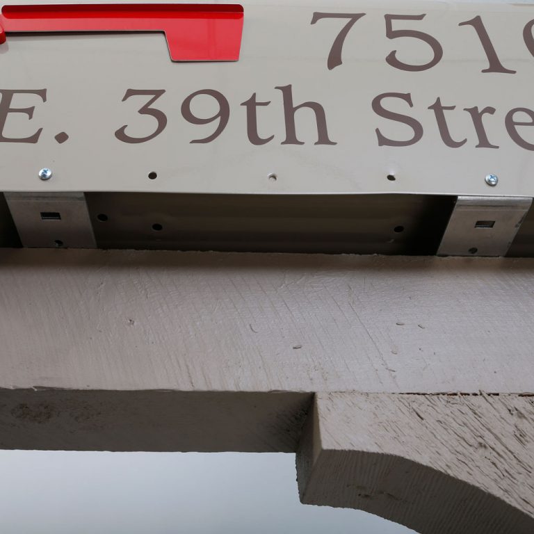 Brackets on mailbox post and mailbox