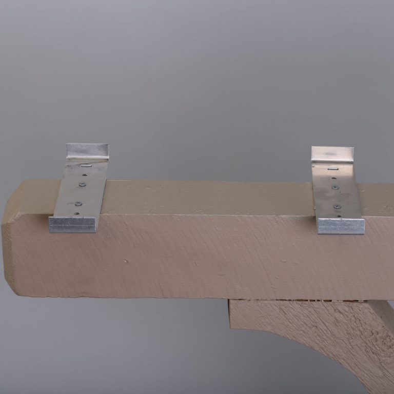 Brackets on mailbox post