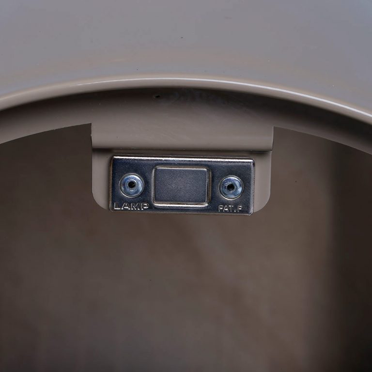 Close up of tan mailbox latch